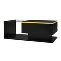 Black and gold modern coffee table on a white background