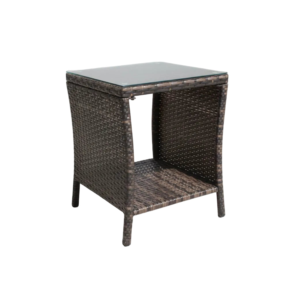 Wicker side table with glass top on a white background
