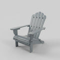 Classic gray solid wood Adirondack chair with a foldable frame and wide armrests placed on an outdoor backyard wooden deck.