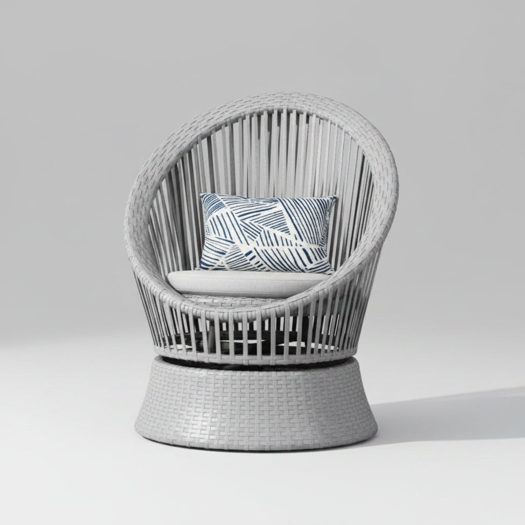 Contemporary 26.7-inch gray wicker lounge chair featuring a rounded PE rattan seat, soft cushion, and sleek black iron legs on a modern balcony.