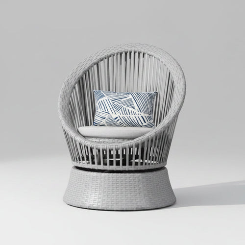 Contemporary 26.7-inch gray wicker lounge chair featuring a rounded PE rattan seat, soft cushion, and sleek black iron legs on a modern balcony.